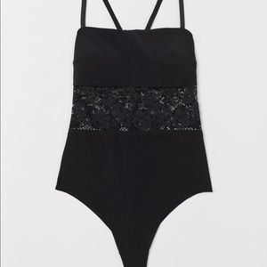 Black micro fiber and lace bodysuit.